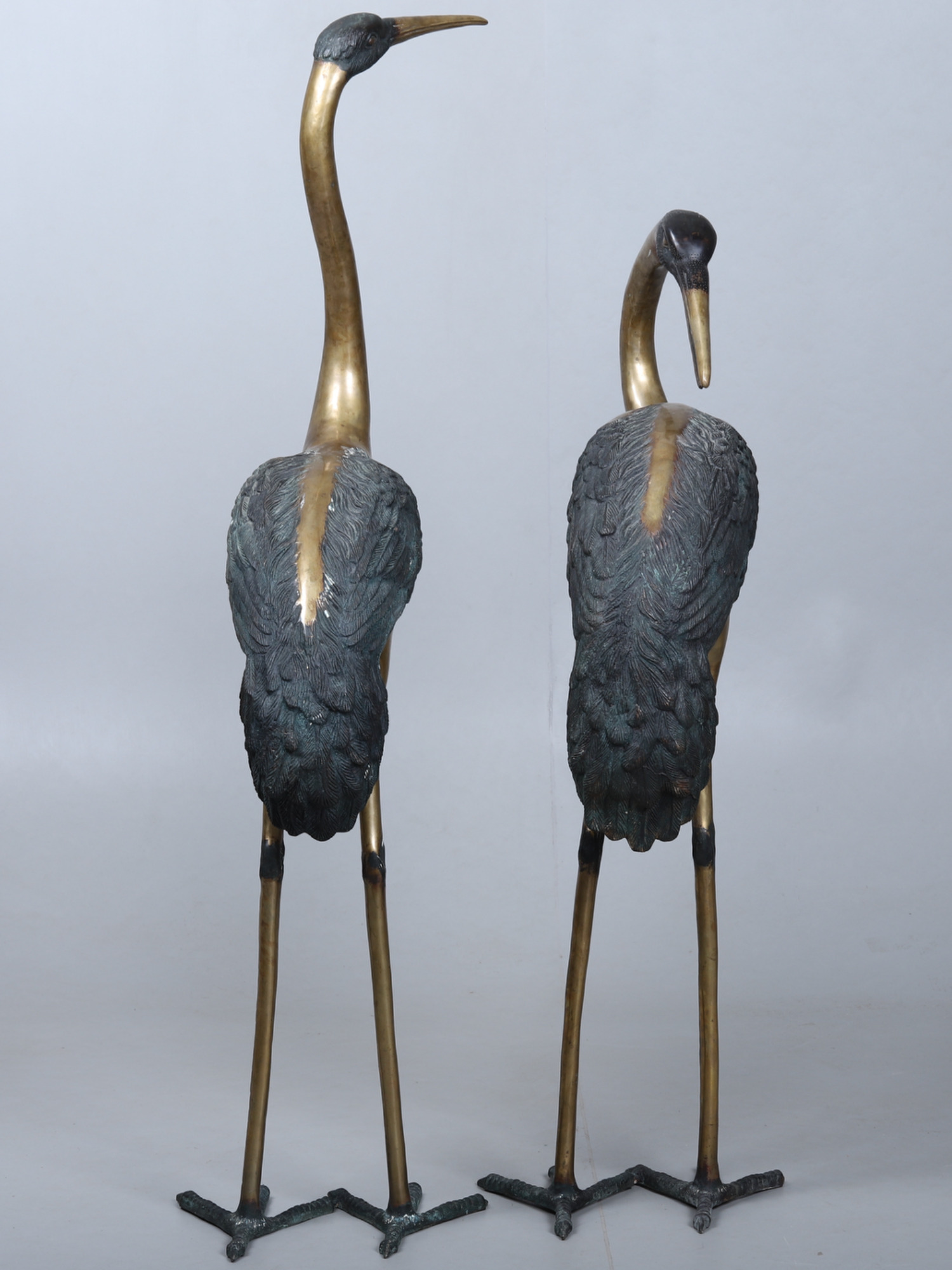 Pair of brass cranes circa 1970