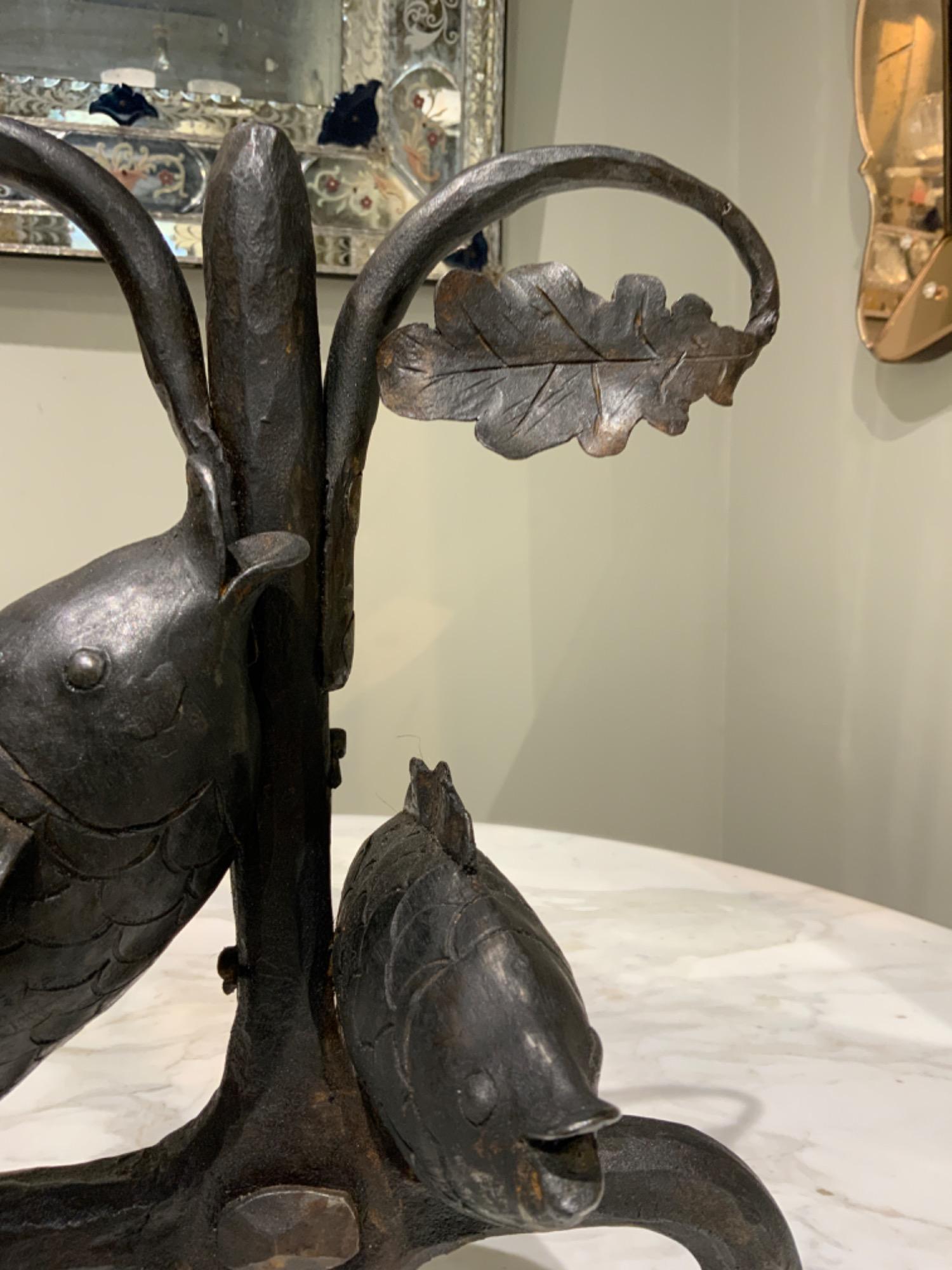 Pair of wrougt iron andirons corca 1950 